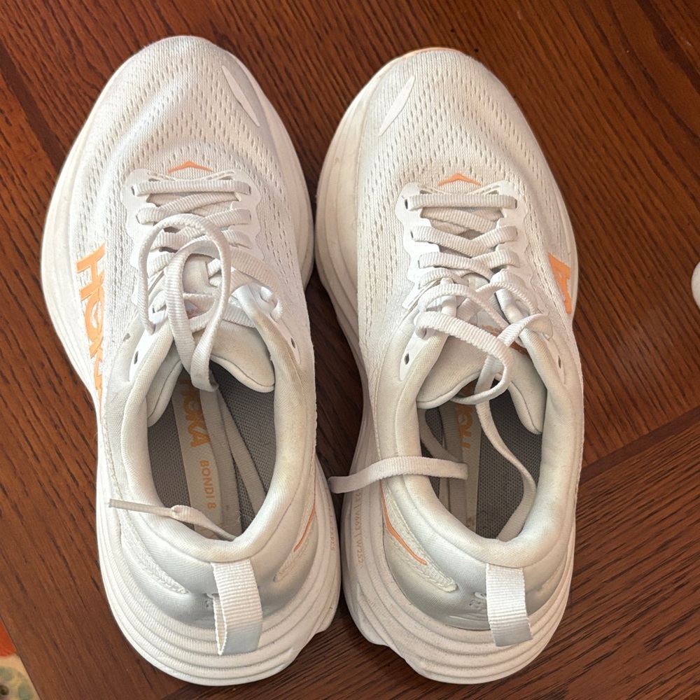 Hoka Bondi White and Peach Athletic Sneakers
